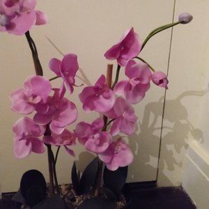 Table Center Piece with Lavender Synthetic Flowers in a thick glass   23 inches